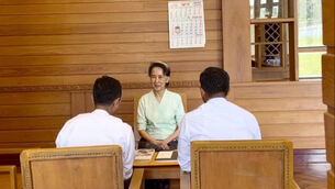 Ms Suu Kyi, pictured, has served several sentences in prison and under house arrest (Myanmar President Spokesperson Office via AP)