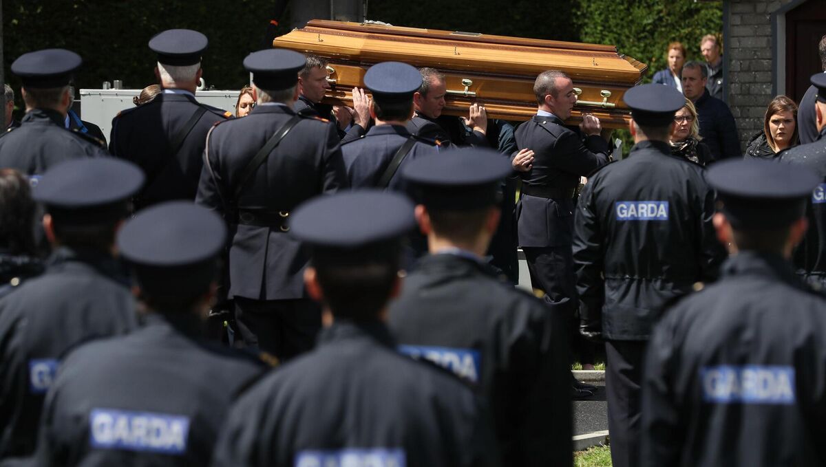 The coffin of murdered detective garda Colm Horkan is carried from St James' church to the cemetery in Charlestown, Co Mayo in June 2020. Picture: Brian Lawless/PA The coffin of murdered detective garda Colm Horkan is carried from St James' church to the cemetery in Charlestown, Co Mayo in June 2020. Picture: Brian Lawless/PA