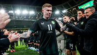 James McClean is applauded off the pitch by team mates after the game 21/11/2023