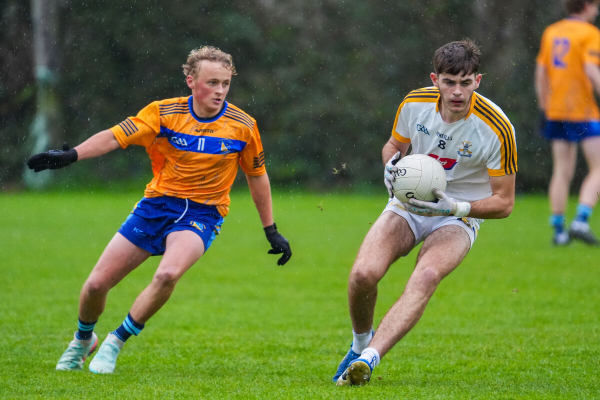 Paul Deasy from Hamilton High School, Bandon, holds possession as Cathal O’Loughlin from St Michael’s gives chase. Pic: Noel Sweeney Paul Deasy from Hamilton High School, Bandon, holds possession as Cathal O’Loughlin from St Michael’s gives chase. Pic: Noel Sweeney