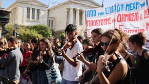 <p>About 10,000 demonstrators, including school and university students, rallied peacefully in central Athens and suburbs, police said. (Photo by Costas Baltas/Anadolu via Getty Images)</p> <p>About 10,000 demonstrators, including school and university students, rallied peacefully in central Athens and suburbs, police said. (Photo by Costas Baltas/Anadolu via Getty Images)</p>