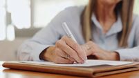 Application, hands writing and retirement home document with tab and checklist for agreement. Paperwork, person and registration