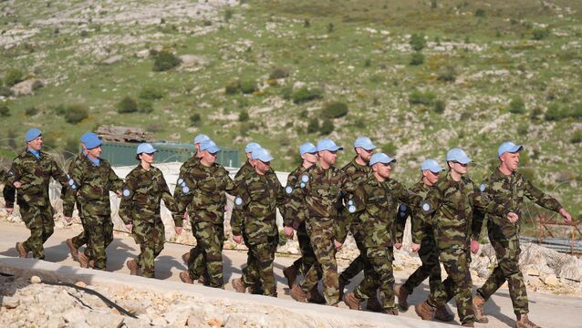 <p>Irish troops on parade at Camp Shamrock near the border with Lebanon and Israel where Irish Defence Forces troops are serving with the Unifil peacekeeping mission.</p>