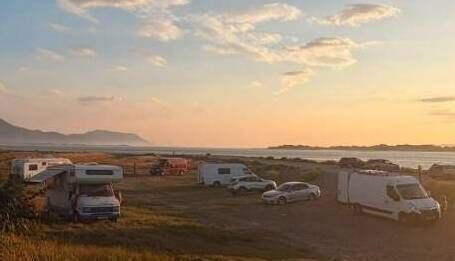 Parking and campervan pitches on the Cromane shoreline in July 2026. Parking and campervan pitches on the Cromane shoreline in July 2026.