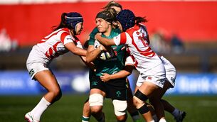 <p>Erin King of Ireland is tackled by Japan players Sawa Harada, left, and Maiko Nishi during the International Women's Rugby fixture. Pic: Shauna Clinton/Sportsfile</p>