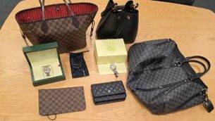<p>High-value items including Louis Vuitton bags, Rolex watches, and jewellery were seized by the Garda National Economic Crime Bureau.</p> <p>High-value items including Louis Vuitton bags, Rolex watches, and jewellery were seized by the Garda National Economic Crime Bureau.</p>