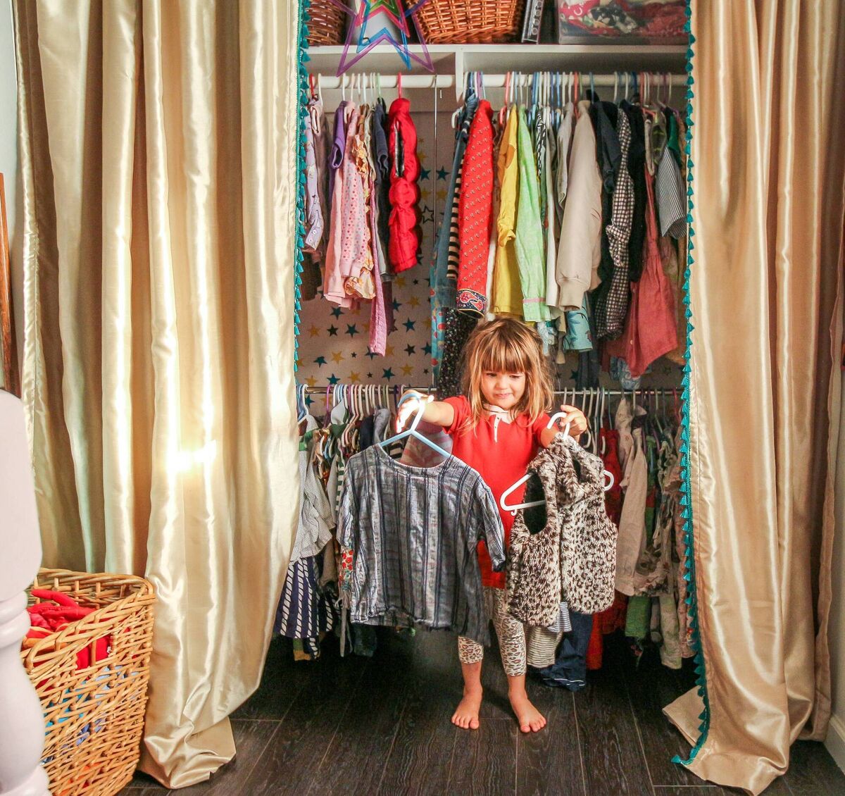 Miss Bradshaw’s little closeted area is created by simply hanging a curtain over a shallow area on one wall. So much more accessible than a solid wardrobe. 