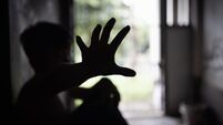 Child abuse concept, silhouette of  child confined in a dark room, prisoner or child abduction, child abuse human trafficking.