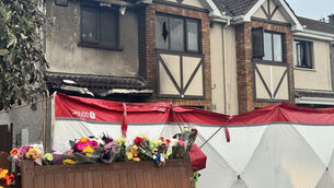 <p>Floral tributes outside the scene of suspected arson attack at a house in Birchwood, Waterford (Micheal O Scannail/PA)</p> <p>Floral tributes outside the scene of suspected arson attack at a house in Birchwood, Waterford (Micheal O Scannail/PA)</p>