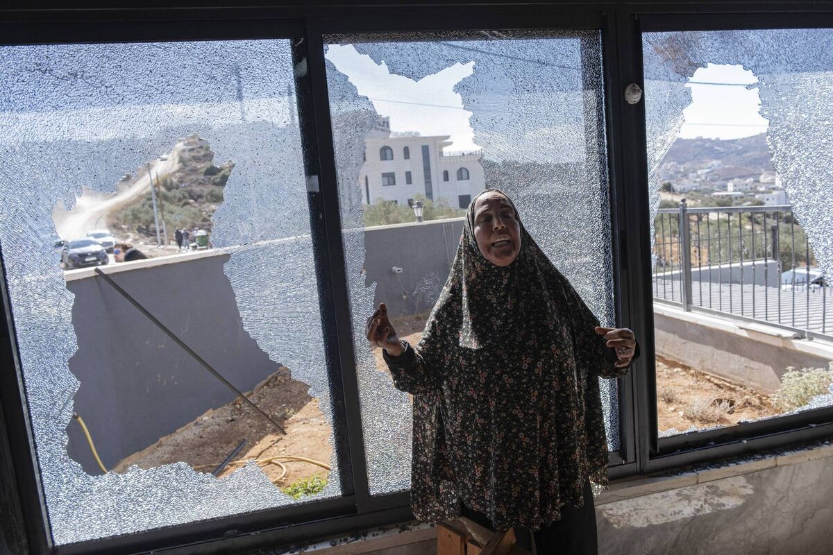 A resident stands beside shattered windows inside a damaged building in Turmus Aya, northeast of Ramallah. Picture: Katrine Dige Houmoller/Middle East Images/AFP via Getty Images A resident stands beside shattered windows inside a damaged building in Turmus Aya, northeast of Ramallah. Picture: Katrine Dige Houmoller/Middle East Images/AFP via Getty Images