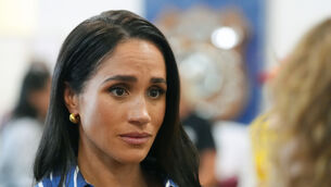 <p>Meghan Markle meets volunteer first responders from Bondi Surf Bathers' Life Saving Club, during a visit to Bondi Beach, on day four of the royal trip to Australia. Picture: PA</p>