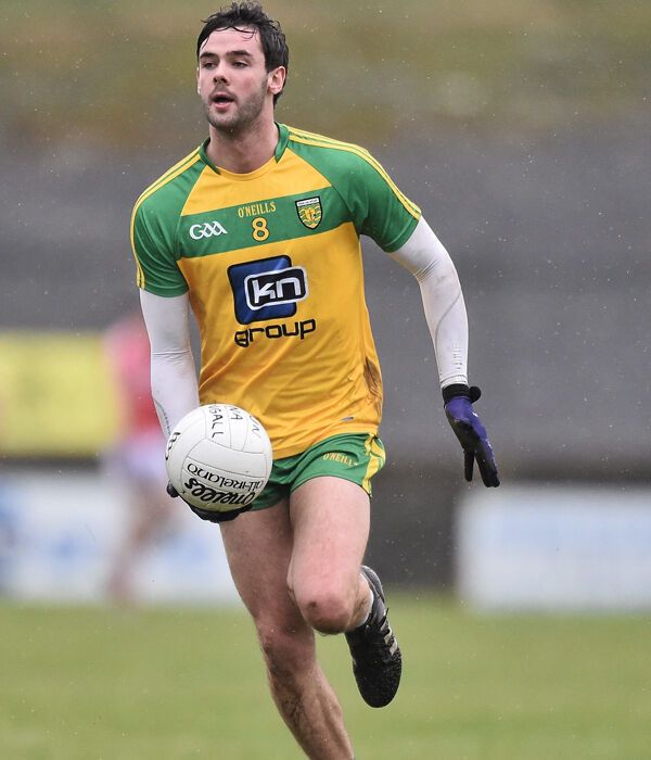 Odhrán Mac Niallais strides forward against Cork.