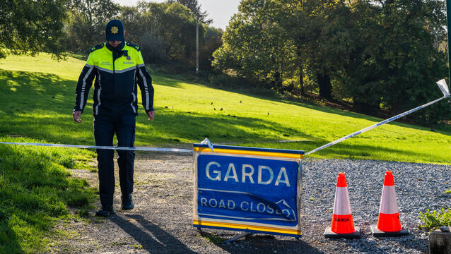 <p>Gardaí at the scene where a body was found in Macroom this morning. Picturee: Noel Sweeney</p>