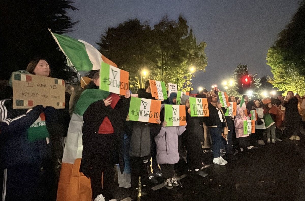 People protest outside the Citywest Hotel in Saggart, south-west Dublin. Picture: PA People protest outside the Citywest Hotel in Saggart, south-west Dublin. Picture: PA