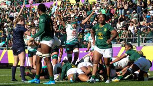 <p>Ireland captain Erin King and team-mates celebrate after Linda Djougang, hidden, scored her second try. Pic: Shaun Roy/Sportsfile.</p>