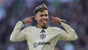 <p>Celtic's Camilo Duran celebrates scoring their side's second goal of the game during the William Hill Premiership match at Easter Road. Pic: Steve Welsh/Press Association.</p> <p>Celtic's Camilo Duran celebrates scoring their side's second goal of the game during the William Hill Premiership match at Easter Road. Pic: Steve Welsh/Press Association.</p>