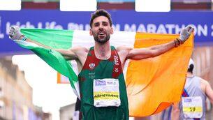 <p>Hugh Armstrong of Ballina A.C celebrates finishing in eighth place at the 2026 Irish Life Dublin Marathon. Pic: ©INPHO/Ben Brady.</p>