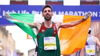 Hugh Armstrong of Ballina A.C celebrates finishing in eighth place at the 2026 Irish Life Dublin Marathon 25/10/2026
