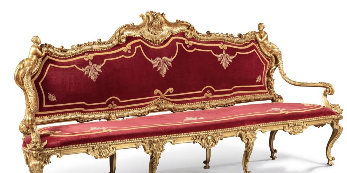 One of a pair of Italian giltwood sofas, Genoa, 1740-1744, from the Paris auction. 
