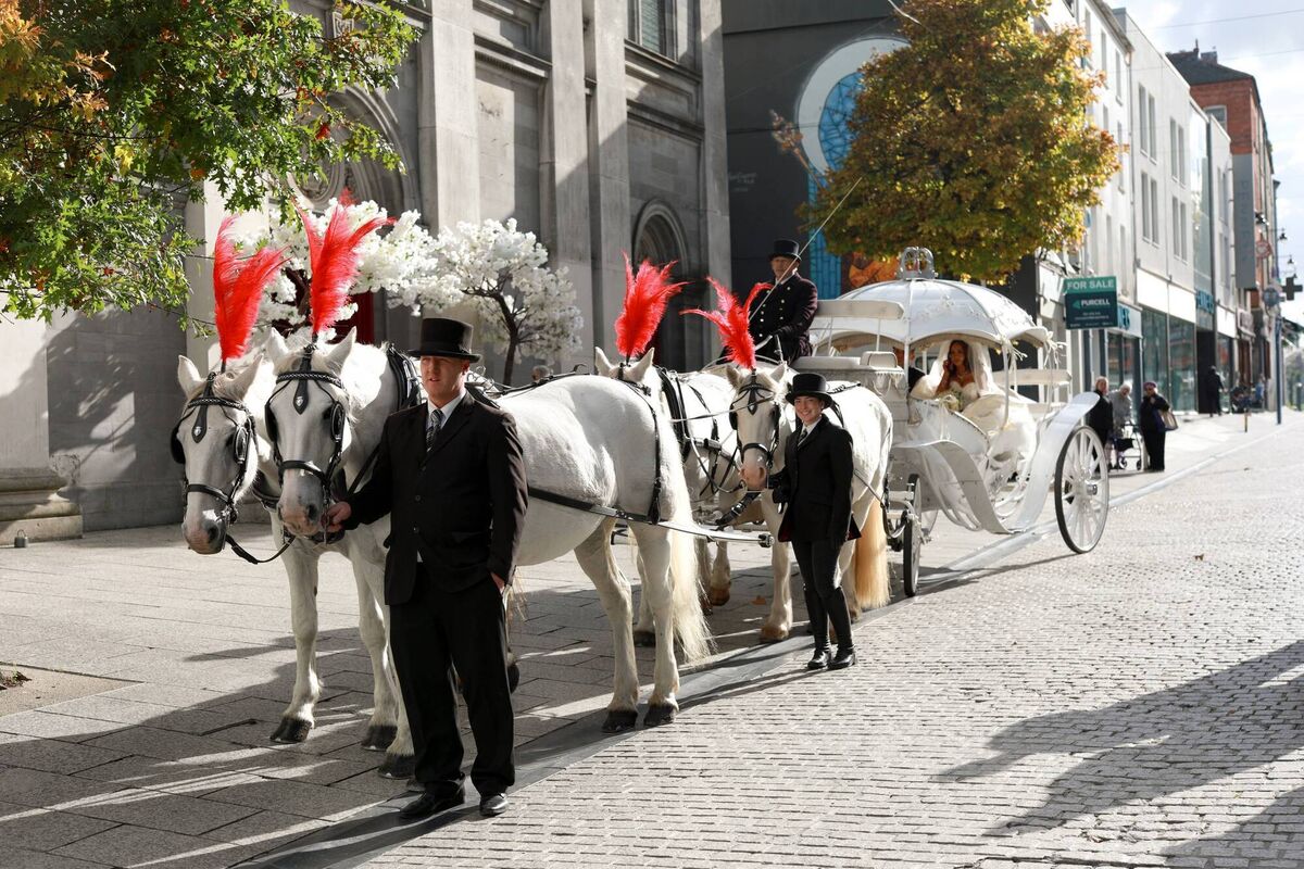 Savannah Stokes arriving in a horse-drawn carriage to the church on her wedding day. Picture: Maryna Korbut Savannah Stokes arriving in a horse-drawn carriage to the church on her wedding day. Picture: Maryna Korbut