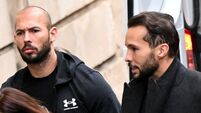 Bucharest, Romania. 10th Jan, 2023. British-US former professional kickboxer and controversial influencer Andrew Tate, center, a