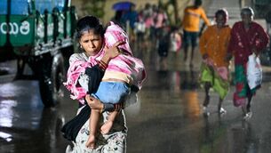 <p>Cyclone Arnab weakened to a “severe” cyclonic storm on Wednesday, the department said in an update. (Photo by Noah SEELAM / AFP via Getty Images)</p> <p>Cyclone Arnab weakened to a “severe” cyclonic storm on Wednesday, the department said in an update. (Photo by Noah SEELAM / AFP via Getty Images)</p>