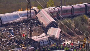 Emergency services work at the scene of a collision between two trains in Urda, Spain (Manu Fernandez/AP)