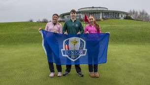 <p>Junior Ryder Cup 2027 flag raising ceremony with Junior Golfers Meghann Hayes, Junior Captain Darragh Doherty and Jessica Sutton holding the official flag on the 18th green. Pic: Kieran Ryan-Benson</p>