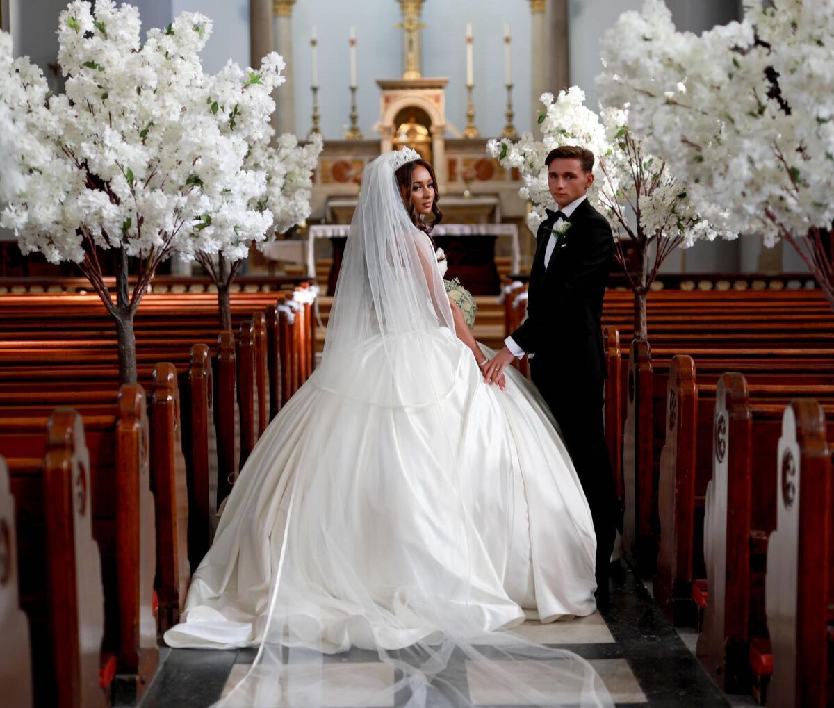 Savannah Stokes and her husband Tom Stokes on their wedding day. Picture: Maryna Korbut Savannah Stokes and her husband Tom Stokes on their wedding day. Picture: Maryna Korbut