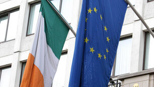 <p>Irish and European Flags (Niall Carson/PA)</p>