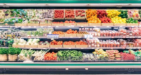 Fresh vegetables on shelf in supermarket