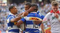 Yaqeen Ahmed celebrates scoring a try with teammates Damian Willemse and Hashim Pead 31/10/2026