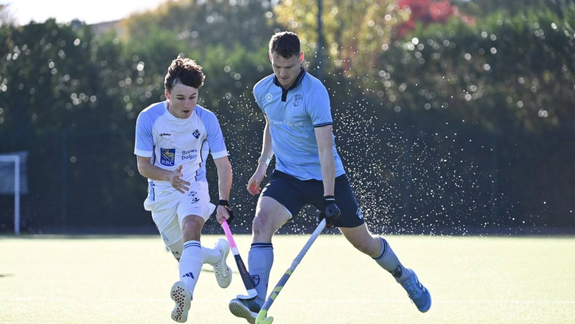 CLOSE CONFINES: Monkstown and Three Rock Rovers shared the spoils in the Dublin Derby. Image courtesy of Irish Hockey Photographers