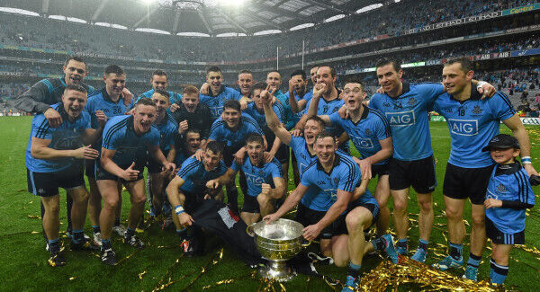Dublin players celebrate with the Sam Maguire cup.