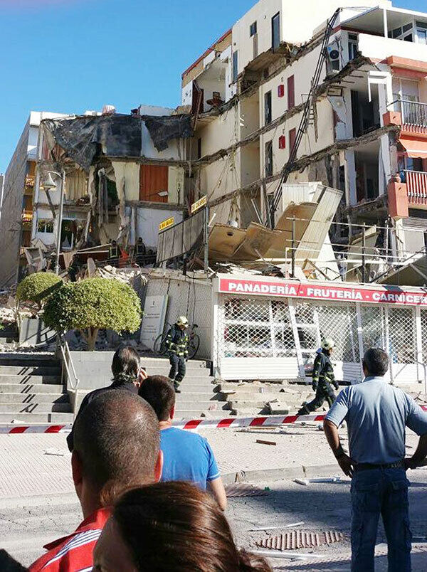 The scene following the collapse of a four-storey building in Los Cristianos, Tenerife. Pic: PA. The scene following the collapse of a four-storey building in Los Cristianos, Tenerife. Pic: PA.