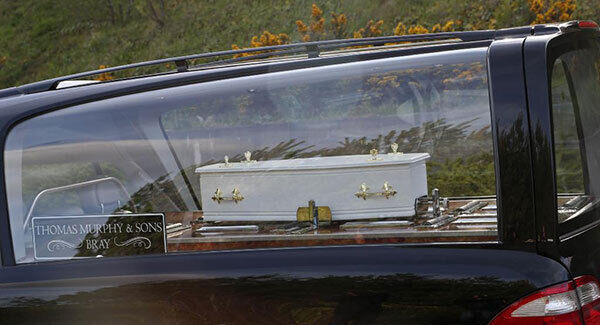 The body of the newborn infant found at Greenstar Recycling , Fassaroe, Bray, Co. Wicklow is removed from the scene this evening. Picture Colin Keegan, Collins Dublin.