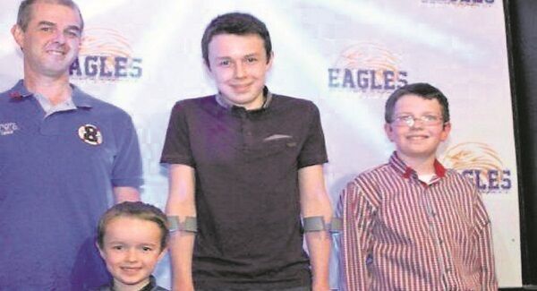 Alan Hawe with the couple's three sons.