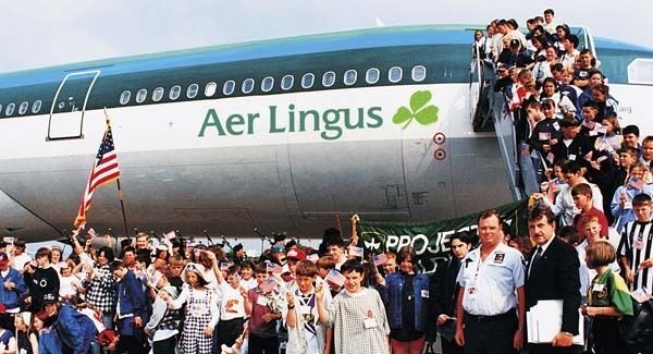 Undated handout photo issued by Project Children of former New York bomb squad detective Denis Mulcahy (right) with children he brought over from Northern Irelend to the United States as part of Project Children.