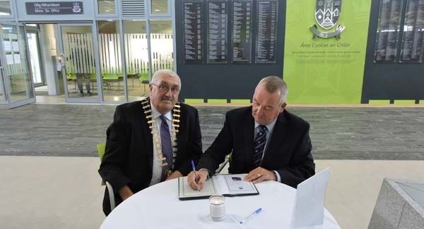 Councillor Bill Chambers and Pat Dowling opening the book of condolence for Caitríona Lucas today. Councillor Bill Chambers and Pat Dowling opening the book of condolence for Caitríona Lucas today.