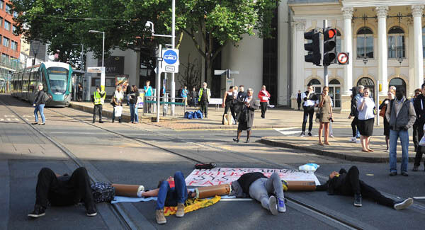 Activists outside Nottingham Theatre Royal shut down part of the city centre tram and bus network to protest for social justice movement Black Lives Matter. Pic: PA Activists outside Nottingham Theatre Royal shut down part of the city centre tram and bus network to protest for social justice movement Black Lives Matter. Pic: PA