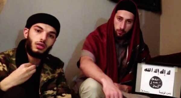 Image taken from an undated video posted yesterday on The Aamaq news agency allegedly showing the two attackers who killed an elderly priest in France pledging allegiance to so-called 'Islamic State'.