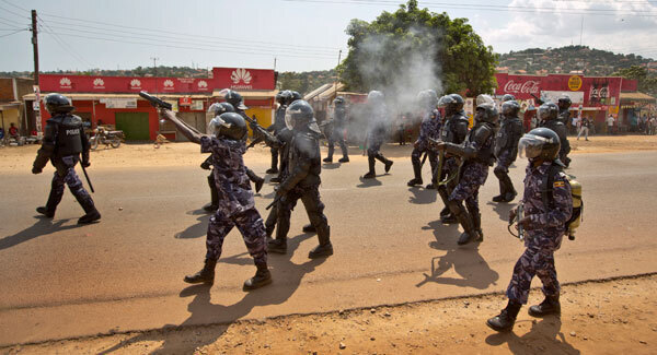 Watch as Ugandan police fire tear gas into crowd at opposition office