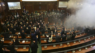Kosovo parliament suspended after opposition launch tear gas