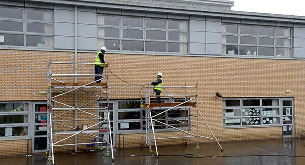 Authorities inspecting a building at Oxgangs Primary School in Edinburgh. Pic: PA