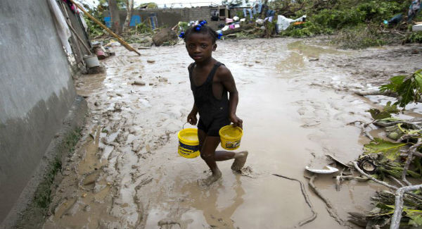 Haitians begin salvage effort as death toll nears 300