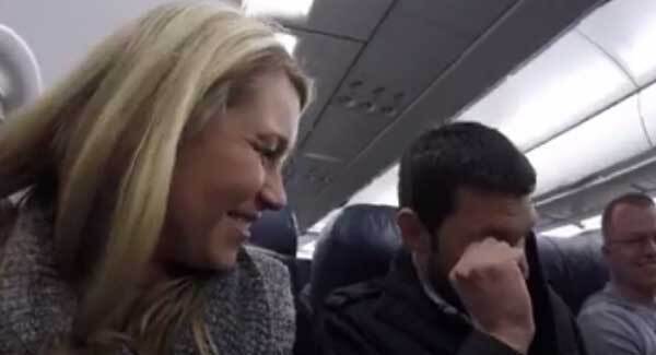 Man finds out he's going to be a dad through the plane loudspeaker