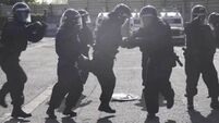 PSNI respond to Gardaí 'Running Man Challenge' in full riot gear