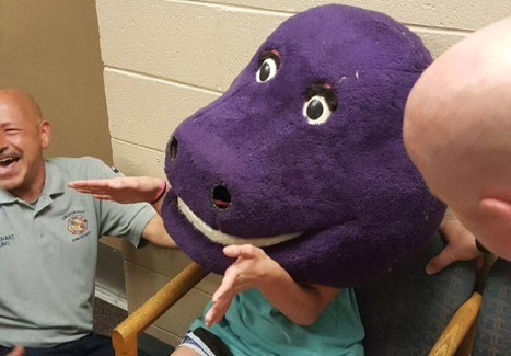 Teen gets trapped in a Barney head and has to go to the Fire Dept for help