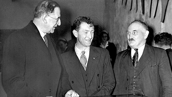 President Eamon De Valera, with Martin Corry, right, at Cobh, Co Cork, in 1955. Corry claimed he was responsible for the execution of Edward Parsons but new evidence casts doubt on his claim.