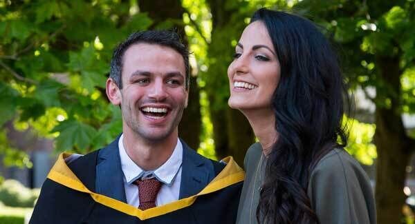 Thomas Barr shares a laugh with his sister and fellow Olympian Jessie Barr after the conferring ceremony. Picture: Alan Place